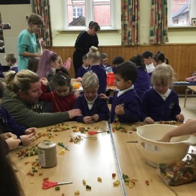 Reception held a Christmas craft parent partnership where parents were invited to come join in creating some Christmas crafts.